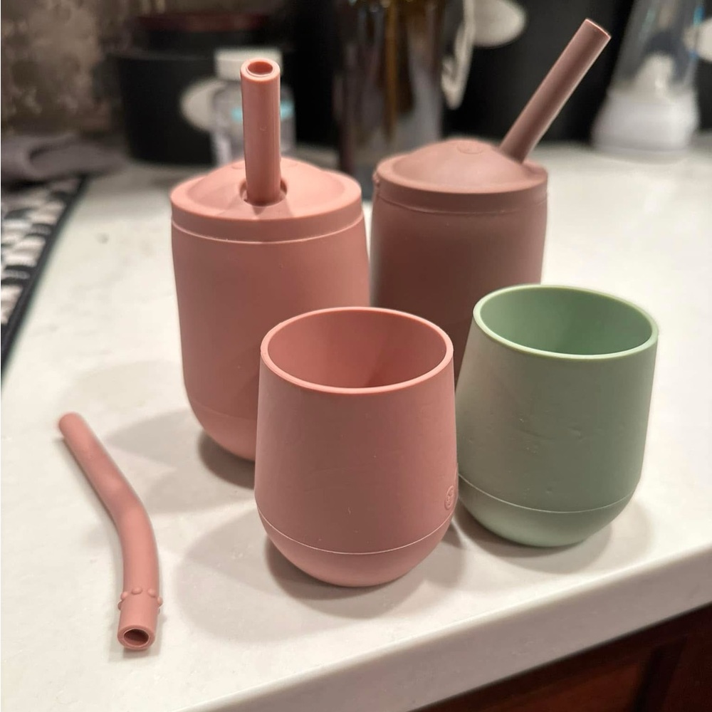 Ezpz silicone cups. 2 tiny cups and 2 mini cups with straws. Plus an extra straw
